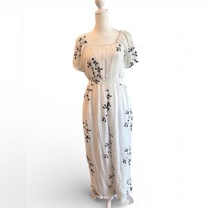 Medium Kindred Anthropologie white smocked navy floral embroidered jumpsuit